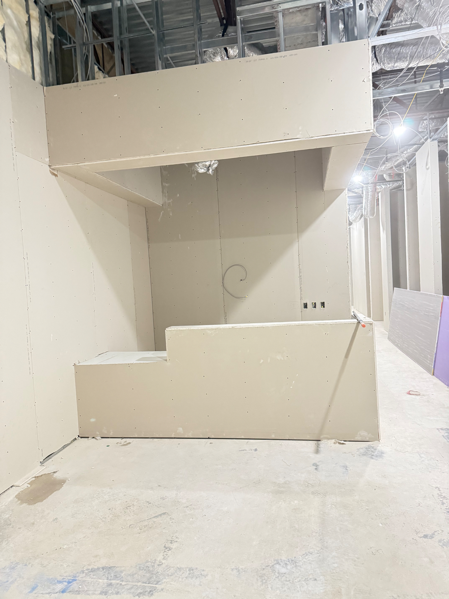 Drywall soffit, bulkhead and reception knee wall we built and hung